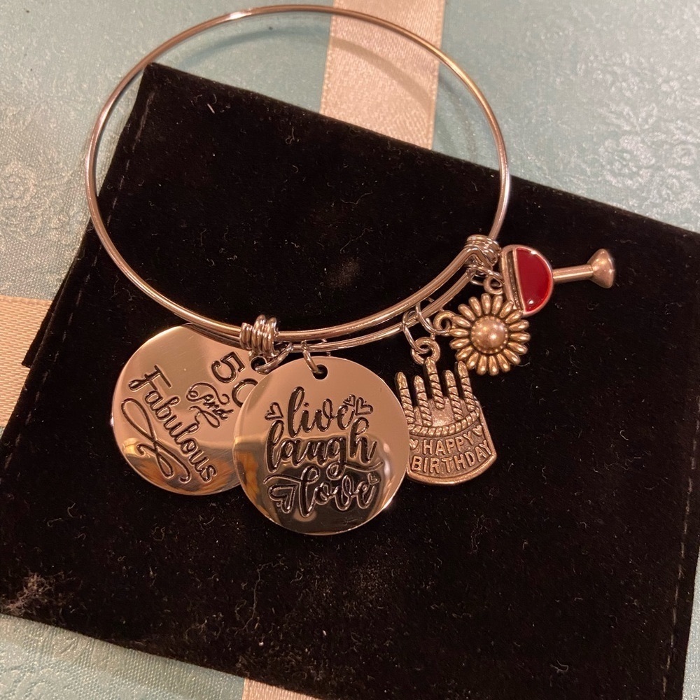 NEW IN BAG 50 & Fabulous charm bracelet and bag